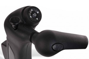 Close-up of a black prosthetic arm with a thumbstick and a set of four arrow buttons for control, featuring textured surfaces and ergonomic design.